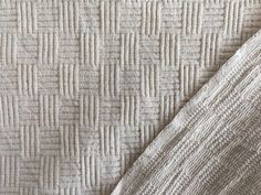 the textured fabric is white and beige