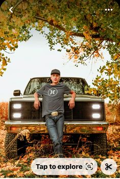 a man standing in front of a truck with the words tap to explore on it