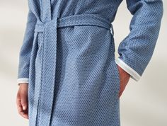 Coyuchi | Unisex Mediterranean Organic Modern Robe XSmall/Small Lake | Like our matching Mediterranean towel collection, our new Mediterranean robe forms a modern, relaxed silhouette with a banded collar and roomy, topstitched seam pockets. The fabric is inspired by the traditional peshtemals used in Turkish hammams. Long sleeves are finished with binding to match the yarn-dyed stripes of our Mediterranean towels — which look great rolled up or down. Double-layered self-belt and dog-eared loops Elegant Fitted Cotton Robe, Fitted Spring Robe For Loungewear, Fitted Cotton Robe For Daywear, Fitted Robe For Spring Loungewear, New Mediterranean, Natural Bedding, Bath Robes For Women, Small Lake, Organic Bath Products