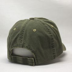 Distressed, Unstructured Soft Crown Low Fitting 6 Panel Cap Features a Dirty Wash, Providing a Vintage Worn-Out Look Pro Stitch on Crown, 6 Embroidered Eyelets and 6 Rows Stitching on Visor Adjustable Velcro Closure One Size Fits Most 100% Herringbone Cotton Adjustable Distressed Baseball Cap, Distressed Green Cap, Distressed Cotton Baseball Cap, Vintage Soft-washed Baseball Cap, Khaki Cotton Military Baseball Cap, 6 Panel Cap, Vintage Wear, Herringbone, Dad Hats