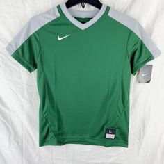 Brand New With Tags! 100% Polyester Green And Gray Colorblock Nike Green Sports T-shirt, Green Short Sleeve Team Spirit T-shirt, Sporty Green V-neck T-shirt, Nike Short Sleeve Team Spirit Tops, Nike Team Spirit Short Sleeve Tops, Green Nike Crew Neck T-shirt, Nike Casual V-neck Top, Green Crew Neck Top With Team Spirit Style, Green Crew Neck Top For Team Spirit