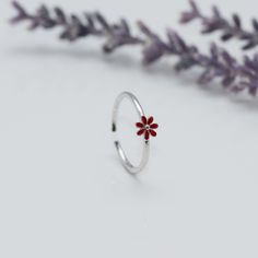 Adjustable ring with delicate red flower design, made of 925 Sterling silver in a minimalist style, ideal gift for girl, teenager or woman. Material: 100% 925 Sterling Silver. Weight: 1.00 grams. Measure:  Adjustable US 6-7 Band width: 1mm.  All orders will be shipped out within 1 business days after the order has been received. UNITED STATES - USPS First Class Mail or Priority mail. * 2 - 4 Business Days * Includes Tracking. International orders, USPS International First Class * 14 days * Inclu Red Open Flower Ring, Red Jewelry For Spring Gift, Red Jewelry Spring Gift, Red Flower Shaped Rings As Gift, Red Flower Shaped Rings For Gifts, Red Flower-shaped Rings As Gifts, Red Flower-shaped Promise Ring, Red Sterling Silver Flower Ring As Gift, Red Flower Ring For Wedding