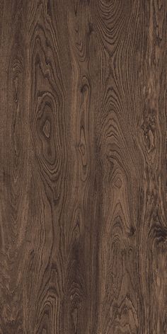 an image of wood textured with dark brown tones on the surface, as seen from above