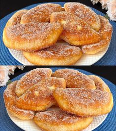 two plates with powdered sugar donuts on them