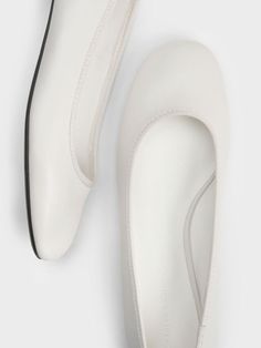 With their clean, sleek profile, these ballet flats are a stylish and versatile pair to add to your collection. The dainty style features ankle-accentuating straps that will provide a flattering and secure fit. In pristine white, they will brighten up your looks and go well with most colour palettes. Set on low block heels that will subtly elevate the frame, these flats are effortlessy chic and offer great style mileage. White Ballet Flats, Dainty Style, Faux Leather Heels, Size Chart For Kids, Charts For Kids, Low Block Heels, Charles Keith, White Flats, Colour Palettes