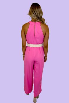 Hot pink jumpsuit Criss cross chest Halter neckline Open keyhole back Natural woven trim belt 92% Polyester, 8% Spandex Sleeveless Pink Jumpsuit For Date Night, Pink Sleeveless Jumpsuit For Date Night, Chic Pink Halter Neck Jumpsuit, Pink Sleeveless Jumpsuit With Adjustable Straps, Pink Fitted Halter Neck Jumpsuit, Glamorous Pink V-neck Jumpsuits And Rompers, Casual Pink One-piece Jumpsuits And Rompers, Hot Pink Jumpsuits, Pink Floral Print V-neck Jumpsuit/romper