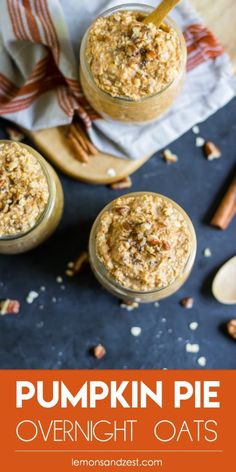 pumpkin pie overnight oats in mason jars with spoons and cinnamon sticks on the side