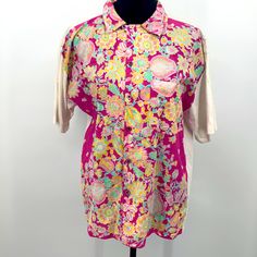 Lovely New With Tag Vintage Fiorucci Shirt. Has Price Tag - Never Worn! Beautiful Pink Floral Pattern With White Sleeves And Back. 20 In Across Top Chest. Medium Or Large Size Shirt Size Tag Not Included On Garment. Excellent Condition. About A 16 In Neck. Spring Short Sleeve Polo Shirt, Spring Graphic Print Polo Shirt, Retro Short Sleeve Polo Shirt For Spring, Printed Pink Camp Shirt For Spring, Classic Collared Tops With Floral Print, Classic Collared Top With Floral Print, Multicolor Cotton Top With Collared Neckline, Retro Spring Polo Collar Tops, Spring Graphic Print Short Sleeve Polo Shirt