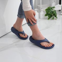 Dive into a realm of comfort and practicality with these Contoured Comfort Flip Flops. They're not just a stylish addition to your summer footwear but also offer a supportive experience with every step. Designed with a focus on comfort and durability, they will be your go-to choice for beach days, backyard barbecues, or simply repose at home. Features: Size: These flip flops come in a range of sizes to ensure a proper fit for various foot dimensions. Material: Made with a durable synthetic mater Comfortable Slip-resistant Sport Sandals With Round Toe, Comfortable Slip-resistant Sport Sandals, Comfortable Slip-resistant Blue Sandals, Blue Round Toe Eva Flip Flops, Comfortable Non-slip Blue Flip Flops, Comfortable Blue Non-slip Flip Flops, Blue Outdoor Flip Flops With Arch Support, Ergonomic Slip-resistant Sandals With Round Toe, Ergonomic Slip-resistant Round Toe Sandals