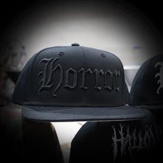 "HORROR HAT Black Snapback Hat Black Embroidery On Black Hat Black Under-Bill Suggested Size Range: Fits hat sizes: 7 - 7 3/4 (22\"-24.25\")" Hip Hop Black Hat With Short Brim, Black Hip Hop Hat With Short Brim, Black Short Brim Hip Hop Hat, Custom Black Snapback Hat With Flat Bill, Custom Black Snapback Hat, Horror Hat, Washed Black Snapback Hat For Streetwear, Black Snapback Cap For Halloween, Horror Black