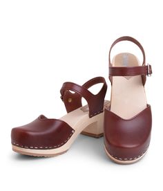 "Loving our Victoria style? - We have more options for you to choose from here: https://www.etsy.com/se-en/listing/903748903/swedish-wooden-clogs-for-women-sandgrens?ref=shop_home_active_1&frs=1 We also have our Saragasso style, that is on a lower heel. Check it out! https://www.etsy.com/se-en/listing/578319753/swedish-wooden-clogs-for-women-sandgrens?ref=shop_home_active_19&frs=1 Limited edition clogs with 30% OFF? SIGN ME UP! https://www.etsy.com/se-en/shop/Sandgrens?ref=seller-platfor Brown Ankle Strap Heels With Rubber Sole, Classic Brown Heels With Single Toe Strap, Brown Mules With Heel And Single Toe Strap, Classic Brown Sandals With Wooden Heel, Classic Brown Clogs With Buckle Closure, Brown Sandals With Wooden Heel And Single Toe Strap, Classic Brown Sandals With Stacked Heel, Classic Brown Heels With Wooden Heel, Classic Brown Clogs With Stacked Heel