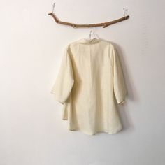 "Ready to wear cream linen blouses size M material: cream linen design: 3/4 sleeves chipao collar wavy hem measurements of the blouse : bust 40\" room (please allow extra room for your body measurements) blouse length 23\" front / 32\" back size M mix linen blouses are also available in the link below https://www.etsy.com/listing/714154694/ready-wear-mix-linen-blouses-size-m-wavy?ref=shop_home_active_9&frs=1" Cream Linen Blouse For Spring, Spring Cream Linen Blouse, Long Sleeve Ramie Blouse For Summer, Summer Long Sleeve Ramie Blouse, Summer Beige Ramie Blouse, Cream Linen Long Sleeve Blouse, Cream Long Sleeve Linen Blouse, Long Sleeve Cream Linen Blouse, Summer Linen Blouse With 3/4 Sleeves