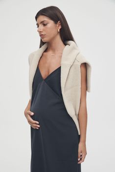 $100 AUD FLASH SALE - LIMITED TIME ONLY. Slip on and go in our 90's vibe maternity Satin Slip Dress. Featuring thin elegant shoulder straps (that can be adjusted in length to your liking), a relaxed fit with maxi length and our iconic invisible side zips part way down the sides for quick, easy & discreet nursing access. We love this worn as is with some sandals for the Summer days, or pair with our Button Crop Cardi (Light Sand) for the cooler days/evenings or for those special occasions. As wit Street Style Maternity Outfits, Maternity Slip Dress, Summer Outfit Pregnant, Pregnancy Fashion Summer, Elegant Pregnancy Outfits, Maternity Summer Outfits, Maxi Dress Pregnant, Classy Pregnancy Outfits, Cool Maternity Outfits