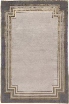 an area rug with a border in grey and beige colors on the bottom half of it