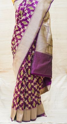 The Banarasi Shikargah Katan Silk Kadwa Saree epitomizes Indian craftsmanship at its finest. Woven in Varanasi, it boasts intricate kadwa weaving, depicting majestic hunting scenes. Fashioned from luxurious Katan silk, it exudes timeless elegance and cultural richness, making it a coveted choice for any special occasion Cow And Krishna, Banarasi Silk Saree, Plain Blouse, Katan Silk, Banarasi Saree, Varanasi, Banarasi Sarees, Yellow Color, Silk Saree