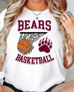 a woman wearing a t - shirt that says bears basketball