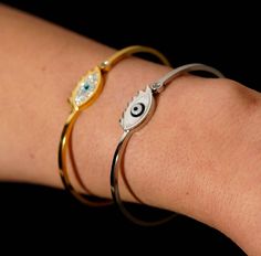 silver braceletcuff braceletgold braceletdainty braceletdesigner banglesgift for herbest friend giftsbridesmaid giftsgifts for momevil eye braceletgold evil eyesilver evil eyeevil eye jewelry Evil eye bangle bracelet This handmade dainty bangle bracelet is an elegant piece. Its made from stainless steel. You can pick between 24k gold plated or 925 silver plated. Dimensions 12x22 mm You can wear it every day, the most important is that is anti allergic and nickel free! The listing is for ONE sing Evil Eye Ring Silver, Gold Moon Necklace, Gold Heart Ring, Small Bracelets, Gold Bracelet Cuff, Gold Bangle Bracelet, Amethyst Bracelet, Evil Eye Pendant, Silver Bangle Bracelets