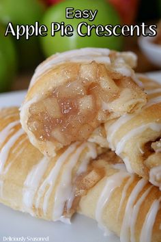 two apple pie crescents on a plate with apples in the background and text overlay that reads easy apple pie crescents