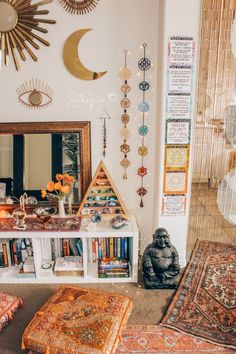 a living room filled with lots of furniture and decor on top of carpeted flooring