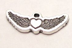 Exclusive ChubbyChicoCharms design. Made from 100% American Pewter. All charms are silver toned. All charms are sold individually as shown. Silver Heart Charm In Metal, Silver Metal Heart Charm, Silver Heart-shaped Charm For Valentine's Day, Silver Heart Metal Charms, Silver Heart Charm For Valentine's Day, Silver Heart Charms For Valentine's Day, Silver Heart Charms For Jewelry Making, Nickel Free Silver Heart Charms, Silver Metal Charms For Jewelry Making