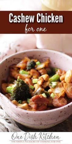 cashew chicken with broccoli in a white bowl