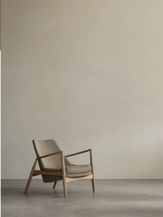 a chair sitting on top of a cement floor