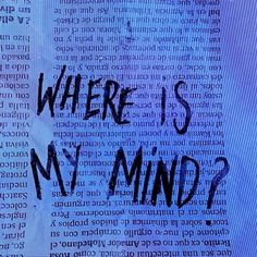 the words where is my mind? written in black ink on a blue newspaper page