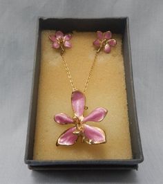 Real orchid with 24k gold platedPendant ~ necklace ~ earringsJewelry setBrand new by La BellePlease visit my store for more exciting items! Pink Flower-shaped Jewelry Sets For Gifts, Pink Floral Jewelry Sets For Gifts, Orchid Flower Pendant Jewelry Gift, Orchid Flower Pendant Jewelry For Gift, Orchid Jewelry, Moon Stone, Necklace Earrings, Vintage Ceramic, Trinket Boxes