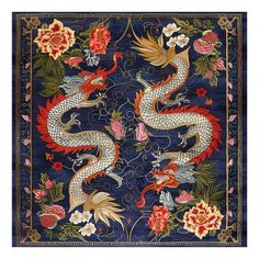 a blue rug with two dragon and flowers on it