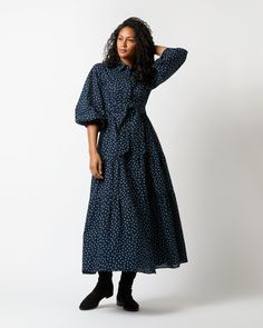 The Isla is a romantic, slightly oversized shirtdress shape with a point collar, puffed three-quarter sleeves with elasticated openings, and a full, tiered skirt, plus an optional self-tie sash to cinch the waist or leave off for a more voluminous silhouette. This one is made up in a lightweight crinkle cotton from Japan that goes year-round easily... add sandals or espadrilles in the summer, or swap for tall boots to take it into cold weather. Oversized Shirtdress, Ann Mashburn, Crinkle Cotton, Clothing Catalog, Buckle Shoes, Sweater Gift, Liberty Fabric, Tier Skirt, Sweater Pants