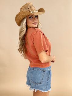 Indulge in the elevated style of our Rust Rock And Roll Tee. Featuring a unique graphic, mineral wash, and western-inspired details, this cropped tee adds a pop of color to any ensemble. The soft and stretchy fabric provides maximum comfort, perfect for concerts and festivals. With a relaxed fit and drop shoulders, this tee exudes chic and relaxed vibes. Self 60% Cotton 40% Polyester Hand wash cold separately. Trendy Stonewashed T-shirt For Spring, Trendy Stonewashed T-shirt For Summer, Trendy Stonewashed Summer Tops, Festival Graphic Tee With Vintage Wash, Vintage Stonewashed Tops For Spring, Casual Crop Top With Frayed Hem For Summer, Western Tops For Country Concerts In Summer, Medium Wash Cotton Crop Top, Relaxed Fit Washed Top For Festivals