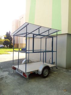 a trailer with a canopy attached to it