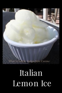 a bowl filled with ice cream sitting on top of a table