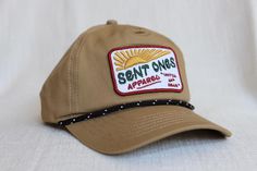 This unstructured rope hat features an embroidered patch with our motto "Until All Hear" on the front and the phrase "Every People Every Place" tagged on the back, both powerful reminders of God's vision from Genesis to Revelation and our call to partner with Him until it's completed.  Your purchase directly supports cross-cultural workers pursuing the multiplication of disciples, churches, and leaders. Casual Outdoor Snapback Hat With Embroidered Patch, Outdoor Adjustable Baseball Cap With Embroidered Patch, Adjustable Snapback Hat With Embroidered Patch For Outdoor, Casual 5-panel Snapback Hat With Embroidered Patch, Summer Adjustable Snapback Hat With Embroidered Patch, Summer Hats With Adjustable Logo Patch, Adjustable Summer Hats With Logo Patch, Powerful Reminders, Embroidered Patch