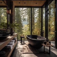 a large bath tub sitting in the middle of a bathroom next to a sink and window