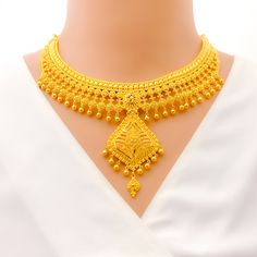 This 22k gold necklace set features an imperial vintage charm design, perfect for adding elegance to any outfit. Weighing 75.5 grams, it showcases a yellow gold finish that enhances its intricate and regal appearance. The set has a length of 17 inches with a 2.5-inch drop and includes adjustable 1.5-inch links for a comfortable fit. Secured with a hook lock, it combines style and practicality. The matching earrings, each 2.3 inches long, feature screw back posts for added security. Ideal for tho 22k Gold Necklace Set, 22k Gold Necklace, Bridal Jewelry Necklace, Precious Stones Rings, Statement Rings Diamond, Diamond Pendant Sets, Lock It, Fancy Necklace, Jhumki Earrings