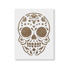 a paper cutout of a sugar skull