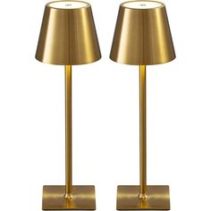 pair of brass lamps on white background