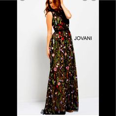 New With Tags In Its Original Bag. Sleeveless, Shear With A Long Hem. Beautiful Floral Embellishment. Floral Print Sleeveless Evening Dress For Party, Black Floral Print Evening Dress For Gala, Black Floral Print Evening Dress, Elegant Black Floral Print Evening Dress, Elegant Black Evening Dress With Floral Print, Elegant Multicolor Spring Evening Dress, Fitted Black Evening Dress With Floral Print, Jovani Gown, Jovani Dress