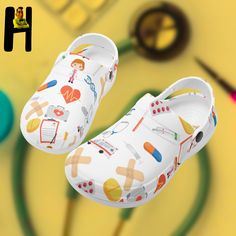 Step into comfort and style while showcasing your nursing pride with our Nursing Clogs. These clogs are not just shoes; they're a tribute to the nursing profession, making them an ideal Christmas or birthday gift and a symbol of appreciation for nurses everywhere. 🩺 A Tribute to Nursing Our Nursing Clogs are a celebration of the nursing profession, adorned with various nursing-related items. From stethoscopes to syringes, these clogs pay homage to the dedication and care nurses bring to their roles. 🎁 Perfect Gift for Nurses Searching for a thoughtful gift for a nurse in your life? Our Nurse Sandals make an ideal Nursing Appreciation Gift or a special present for birthdays, acknowledging their commitment to healthcare. ️ For Every Nurse Whether you're an LPN, CNA, Nurse Practitioner, or Nursing Crocs, Nursing Clogs, Nursing Profession, Stethoscopes, Nurse Appreciation Gifts, Clogs And Mules, Crocs Crocband, Gift For Nurse, Nursing Shoes