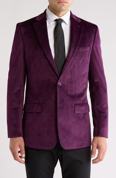 Look sophisticated at your next soirée in this dapper dinner jacket crafted from luxuriously soft velvet. Two-button closure Notched lapels Chest welt pocket; front flap pockets Lined 100% polyester Dry clean Imported Classic Formal Velvet Outerwear, Classic Velvet Outerwear For Formal Occasions, Classic Velvet Outerwear With Button Closure, Formal Velvet Blazer With Button Closure, Velvet Blazer With Button Closure For Formal Occasions, Classic Blazer With Button Closure For Party, Velvet Business Tuxedo Outerwear, Classic Party Blazer With Button Closure, Formal Fitted Velvet Outerwear