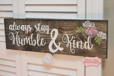 a wooden sign that says, always stay humble and kind on the side of a door