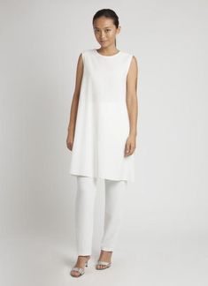 KAAREM - Piece of Air Sleeveless Overlap Dress - White Sleek Sleeveless Day Dresses, Sleek Sleeveless Daywear Dresses, Sleek Sleeveless Viscose Dress, Sleek Sleeveless Midi Dress For Daywear, Sleeveless Midi Dress With Side Slits, White Sleeveless Viscose Dress, Chic Structured Sleeveless Dress, White Sleeveless Viscose Midi Dress, Sleek Sleeveless Midi Dress For Work