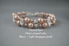 a bracelet with pearls and crystals on it