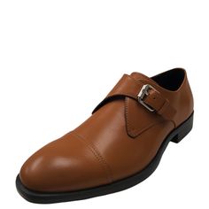 Calvin Klein's cap-toe dress shoes feature a single monk strap with shiny buckle detailing. A stylish monk shoe with a clean, classic silhouette. Leather upper features a cap toeMonk strap buckle closureSynthetic and textile liningsLightly padded footbedDurable rubber outsole; Imported Brown Cap Toe Monk Strap Shoes For Business, Fitted Monk Strap Shoes With Round Toe For Office, Business Cap Toe Dress Shoes With Removable Insole, Business Dress Shoes With Removable Insole And Cap Toe, Classic Loafers With Metal Pin Buckle For Business, Brown Cap Toe Monk Strap Shoes With Buckle, Brown Cap Toe Monk Strap Shoes With Buckle Closure, Classic Almond Toe Dress Shoes With Buckle Closure, Brown Business Dress Shoes With Buckle Closure