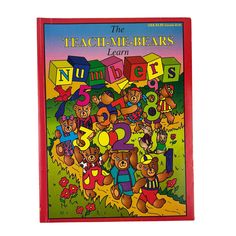 a children's book with numbers and teddy bears on the cover, which is written in large letters