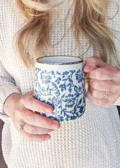 woman holding blue and white coffee mug Gender Neutral Baby Nursery, Coffee Room, Baby Nursery Neutral, Coffee Ritual, Apothecary Candles, Nursery Lighting, White Mugs, Coffee Accessories, Coffee Station