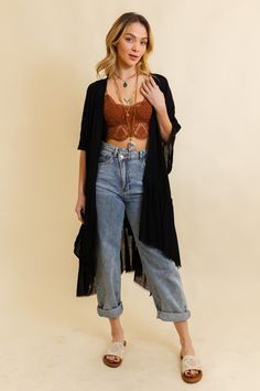 This bohemian-inspired kimono features a solid color palette and delicate ruffle edges, creating a timeless and effortlessly stylish look. Perfect for layering over any outfit, this kimono adds a touch of boho flair to your ensemble. Whether you're dressing up for a night out or looking for a stylish cover-up, our Solid Ruffle Edge Bohemian Kimono is the go-to choice for easy, breezy fashion. Our ethereal kimonos, offered in black, blue-gray, and ivory, embody effortless elegance. Each piece fea Spring Bohemian Outerwear With Lace Trim, Bohemian Spring Outerwear With Lace Trim, Summer Bohemian Outerwear With Frayed Hem, Bohemian Outerwear With Frayed Hem For Festivals, Bohemian Spring Duster With Open Front, Bohemian Fringe Outerwear For Summer, Bohemian Spring Open Front Duster, Spring Bohemian Open Front Duster, Bohemian Open Front Duster For Spring