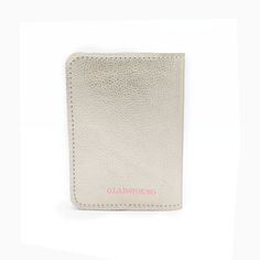 Champagne Leather Calling all world travelers! This passport holder is fashioned from soft leather and designed with two card slots for easy access to your travel essentials while keeping your passport safe and secure. Make it shine with custom gold foil monogramming. High quality leather Two inner slip pockets Dimensions 5.5"L, 5.25"W Gold Bifold Wallets For Daily Use, Gold Bifold Wallet For Daily Use, Gold Wallets With Interior Card Slots For Everyday, Gold Bifold Wallet With Rfid Blocking, Gold Wallets With Rfid Blocking For Travel, Gold Rectangular Wallets For Personal Use, Gold Bifold Wallets For Travel, Gold Travel Wallets With Rfid Blocking, Travel Bifold Card Holder