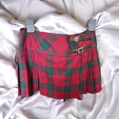 The most amazing style and quality vintage tartan mini skirt from the 90's. Made in Scotland. In perfect condition. Size uk 14, us 10, eu 42. Measurements (item lying flat). Width - 16.4 inch (all around x 2). Length - 14.7 inch. Please contact us with any questions. Thank you and happy shopping! Fitted Plaid Mini Skort, Fitted Plaid Mini Skirt In Preppy Style, School Fitted Plaid Mini Skirt, Fitted Plaid Skort For School, Fitted Plaid Pleated Mini Skirt, Plaid Pleated Short Skort, Preppy Plaid Mini Skirt For School, Fitted Pleated Plaid Mini Skirt, Plaid Pleated Skort